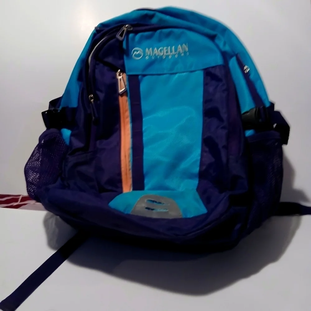 Magellan Outdoors Blue and Purple Backpack with Structured Design. Very Nice!!